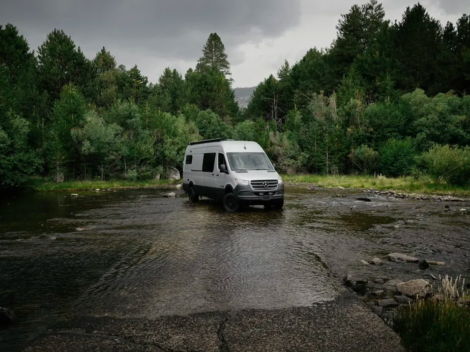 conversion-campervan-parked-by-river