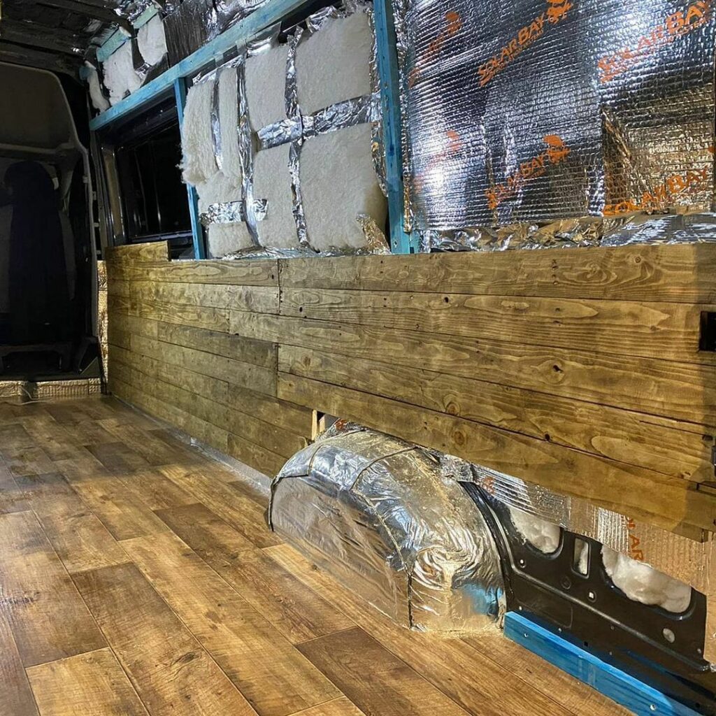 conversion van build timeline installing tongue and groove wood flooring and walls