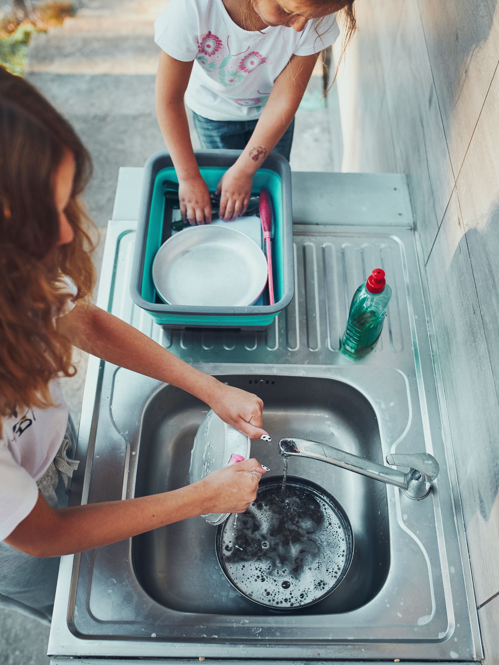 washing dishes with your campervans water system