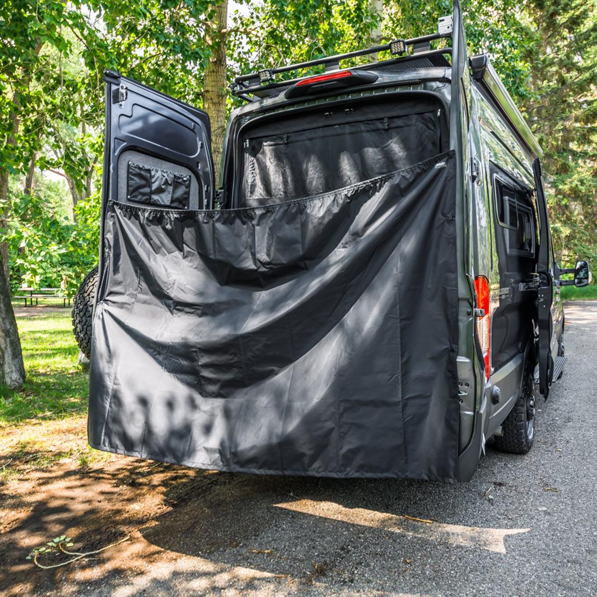 Shower curtain in back of a camper van