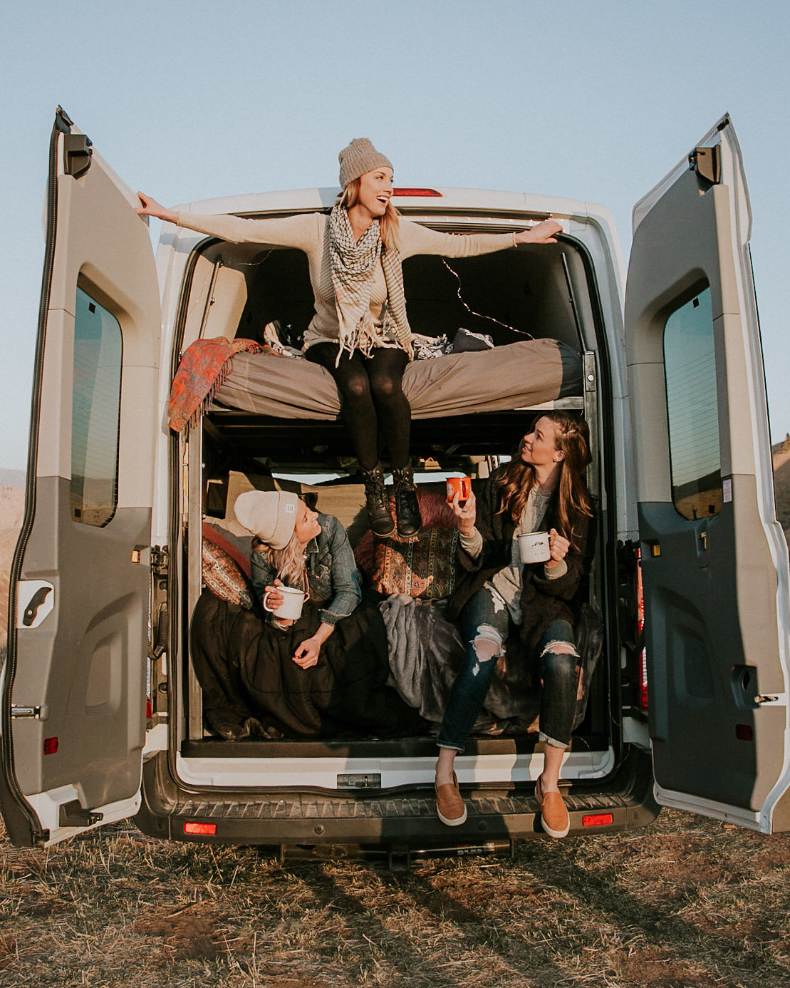 group of friends adventuring in wandervans camper