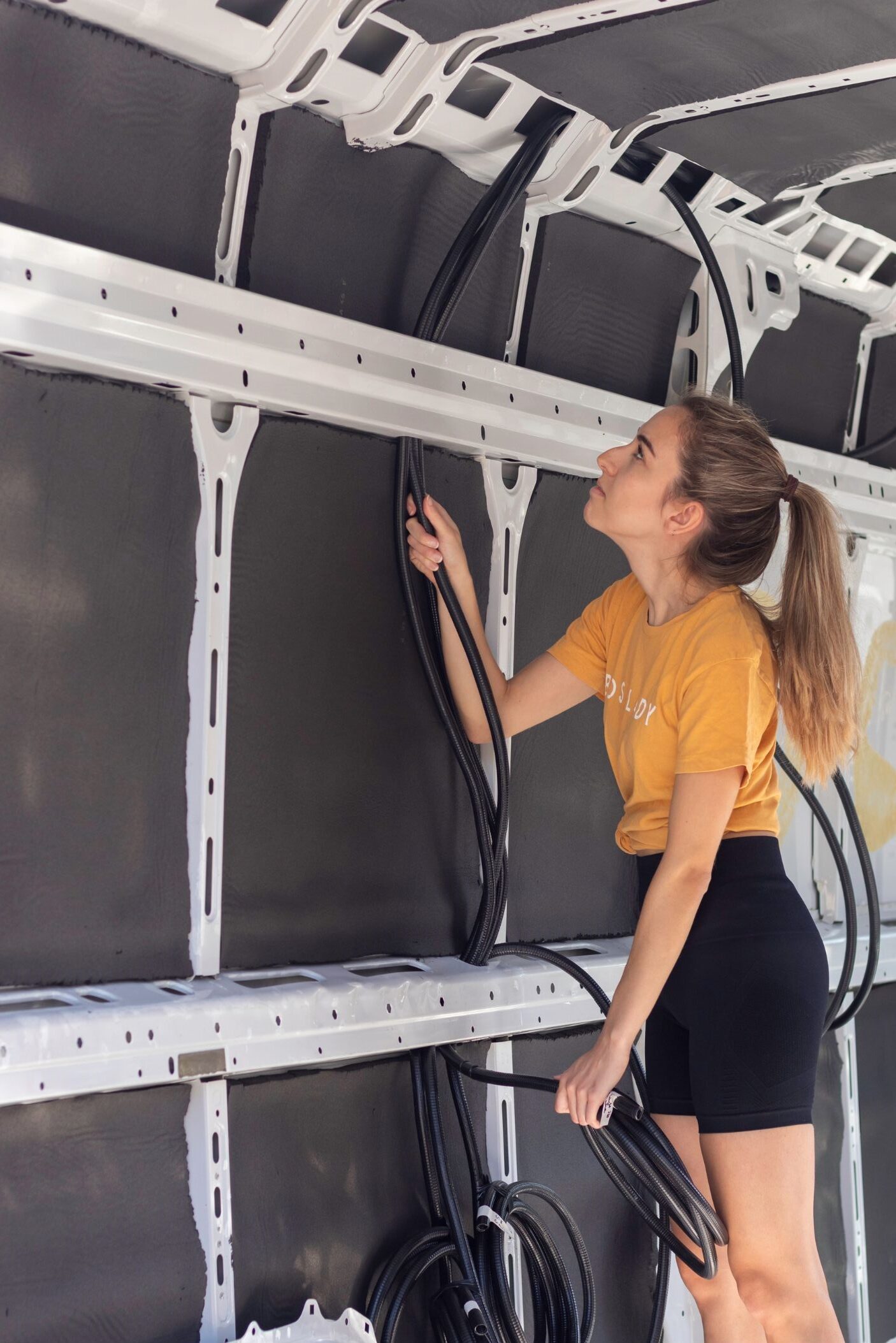 Person wiring a camper power system