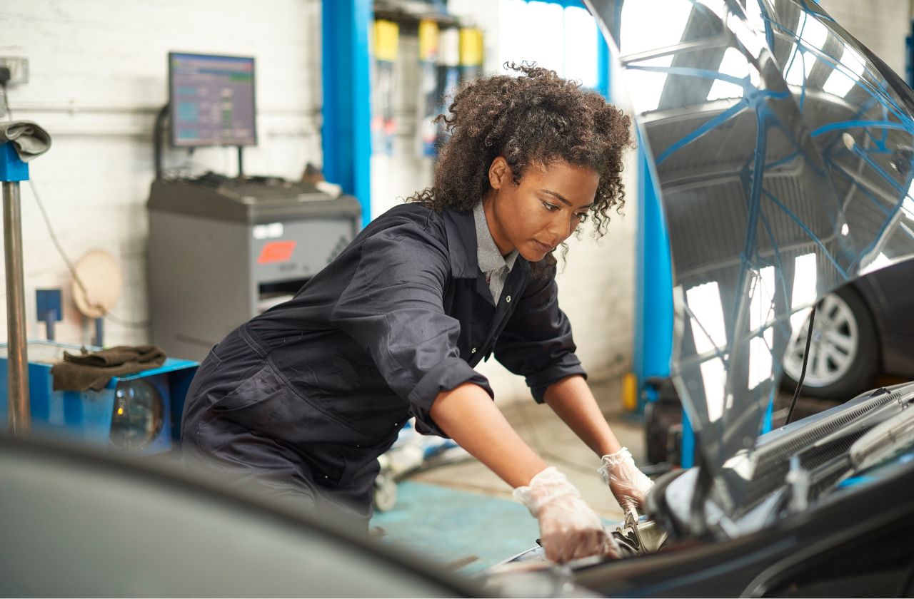 Van upfitter performing repairs